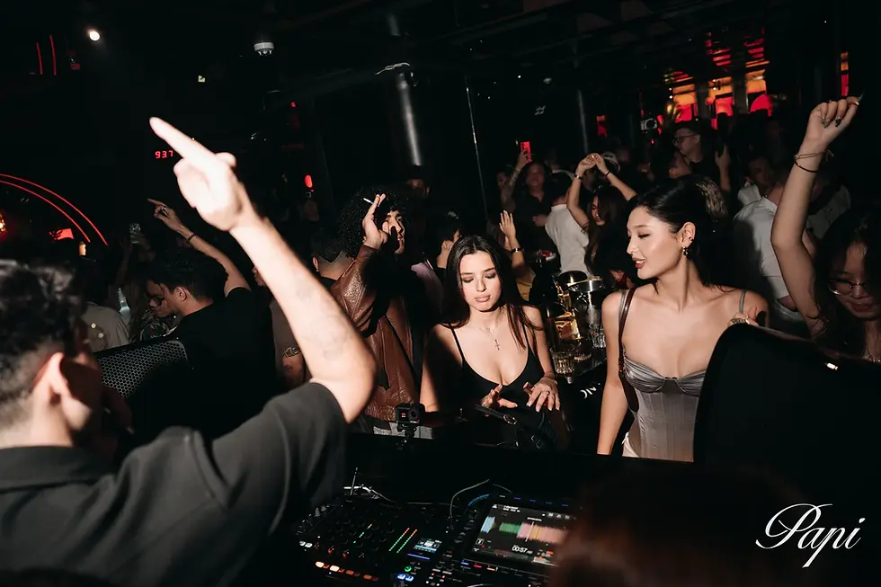 Guests enjoying a night at PAPI Saigon