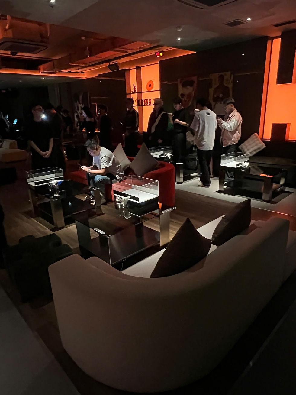 Sofa seating and low tables at Neighborhood nightclub in Saigon.
