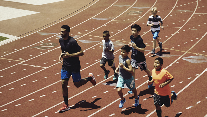Kids running on a track