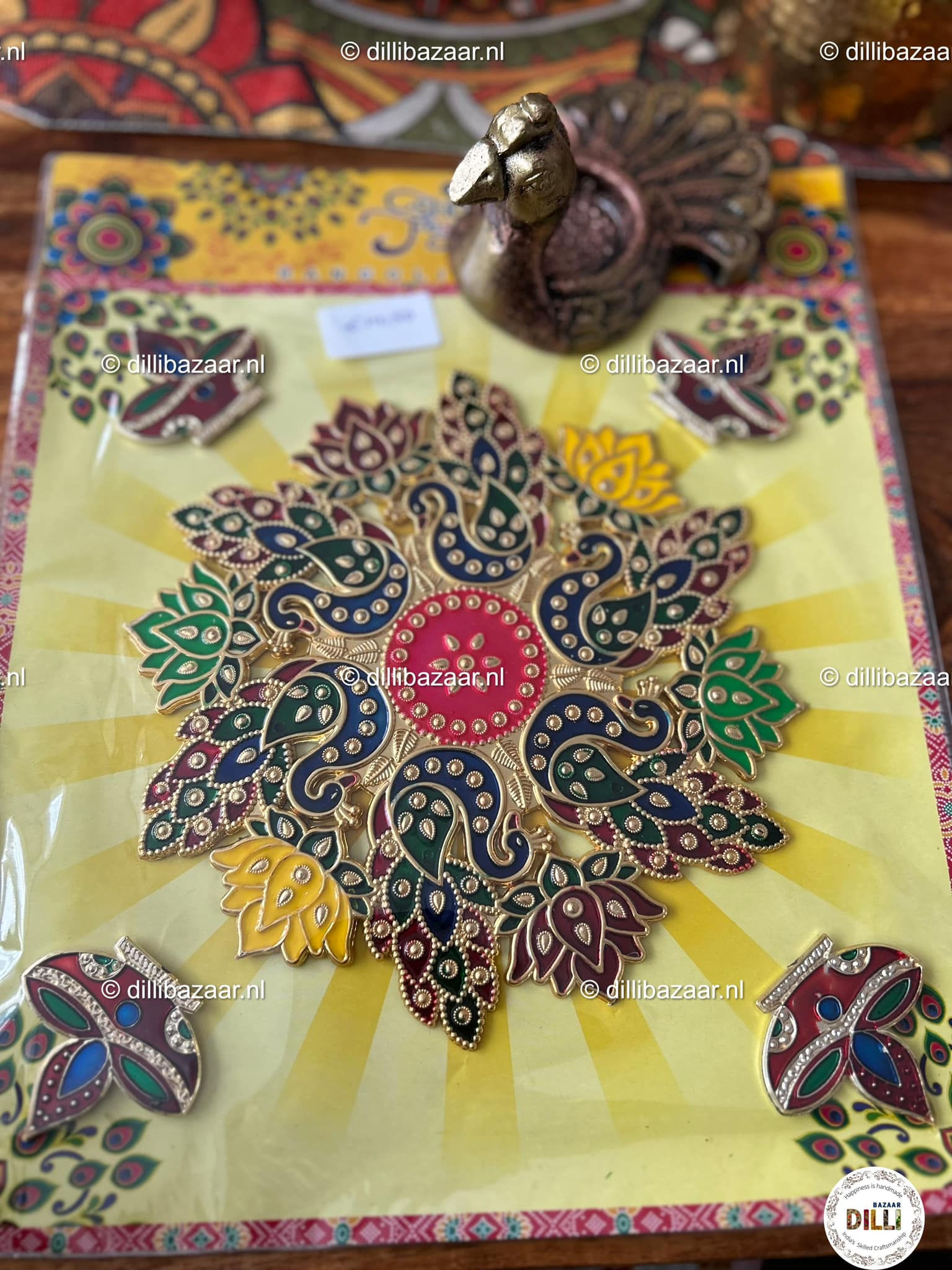 Peacock with diya rangoli