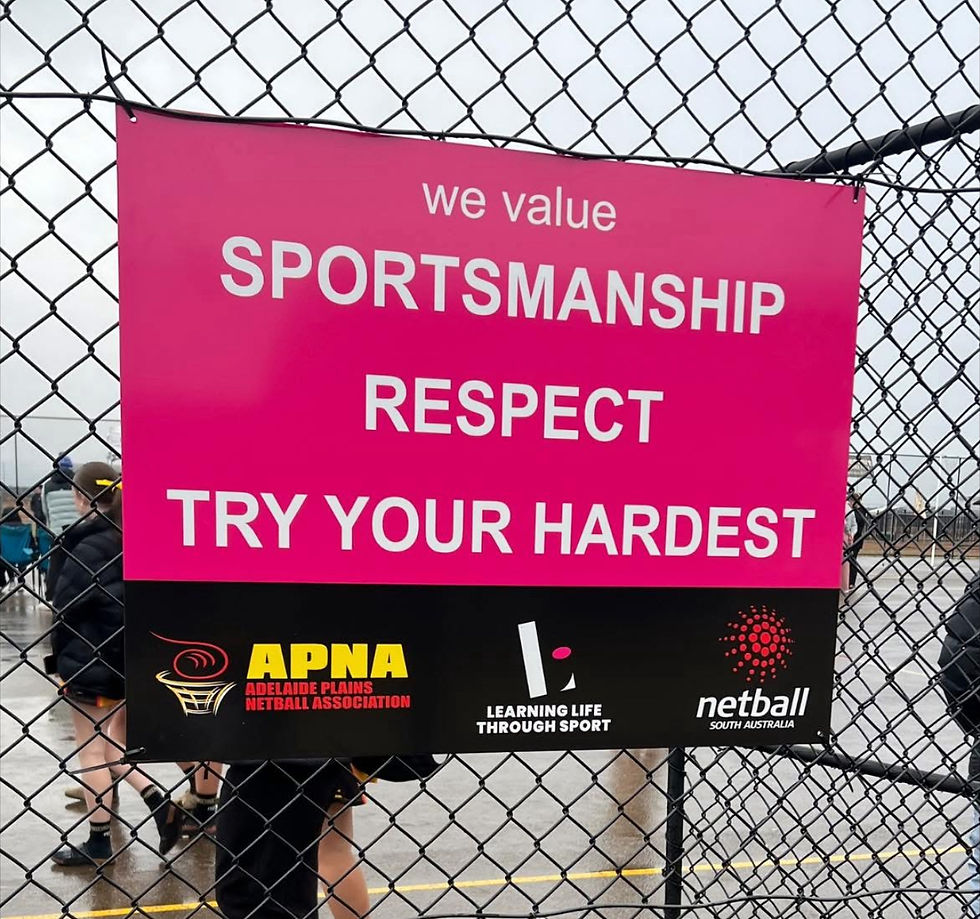 Pink sign saying we value Sportsmanship, Respect, Try Your Hardest