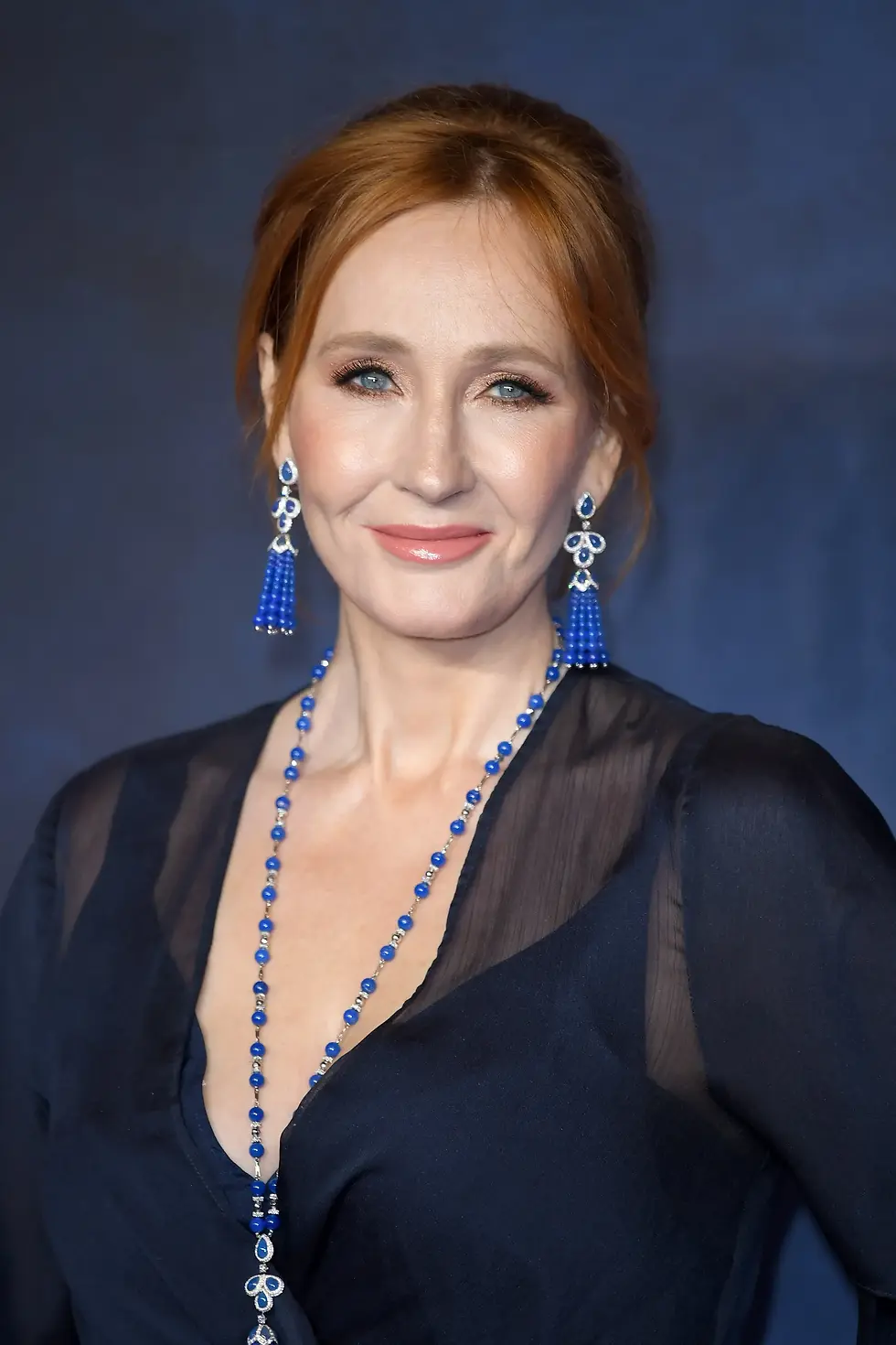 J.K.Rowling, the Harry Potter writer, is dazzling in blue attire.