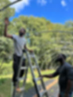 Charles Greenlea and crew installing farm infrastructure for Black farmers