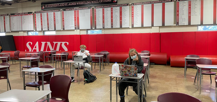 Nicole Cruthirds ‘22 and Carter Hansen ‘22 zooming into their classes from the wrestling room!
When the classrooms overflow, students head in here to abide by the social distancing rules. The Wrestling room and Gym have turned into classrooms during the day in order for both cohorts to be at school in a safe manner.
