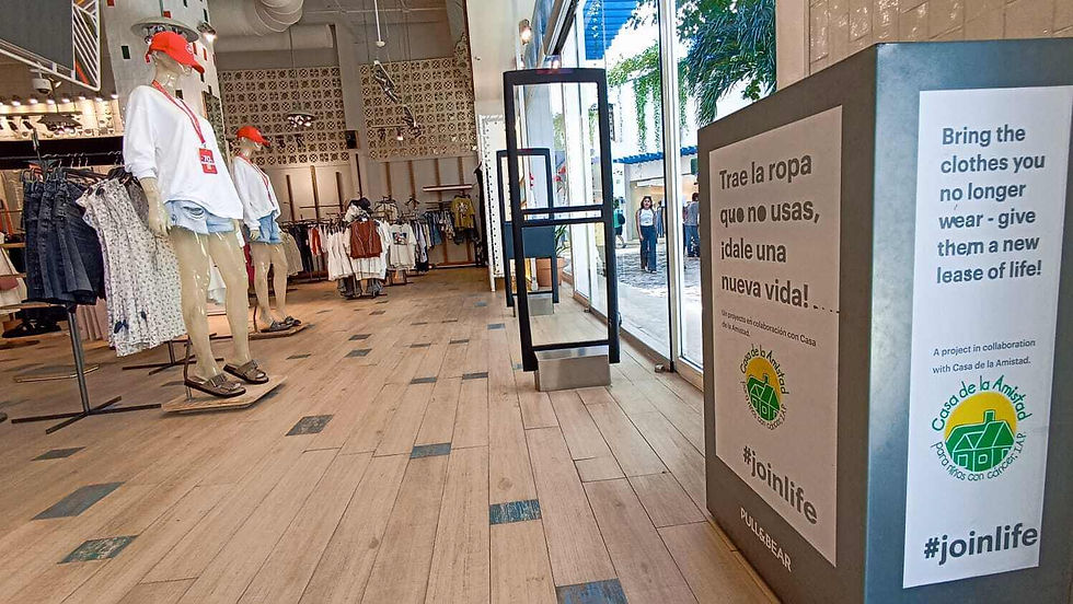 This store has a designated bin near the entrance for donating clothes to children with cancer.
