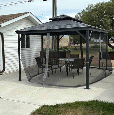 Outdoor gazebo with seating at Mannville Seniors Manor.