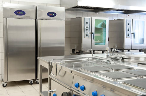Commercial kitchen with stainless steel refrigerators