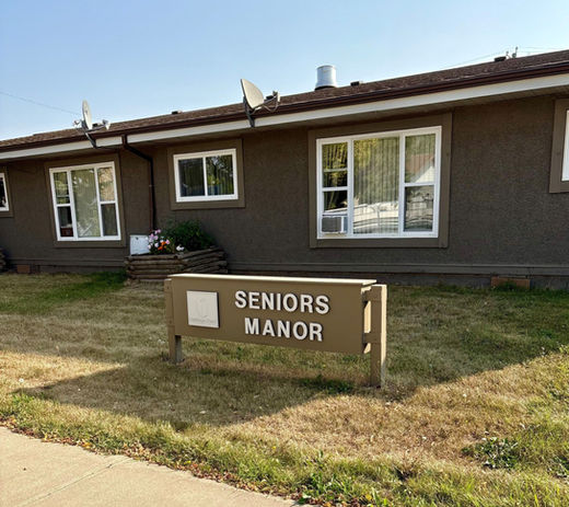 Mannville Seniors Manor exterior and sign.