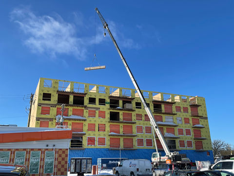 crane hoisting construction material
