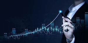 Hand interacting with a glowing upward trend