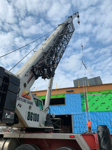 crane in front of a construction