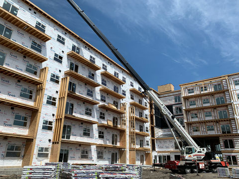 crane in front of buiding