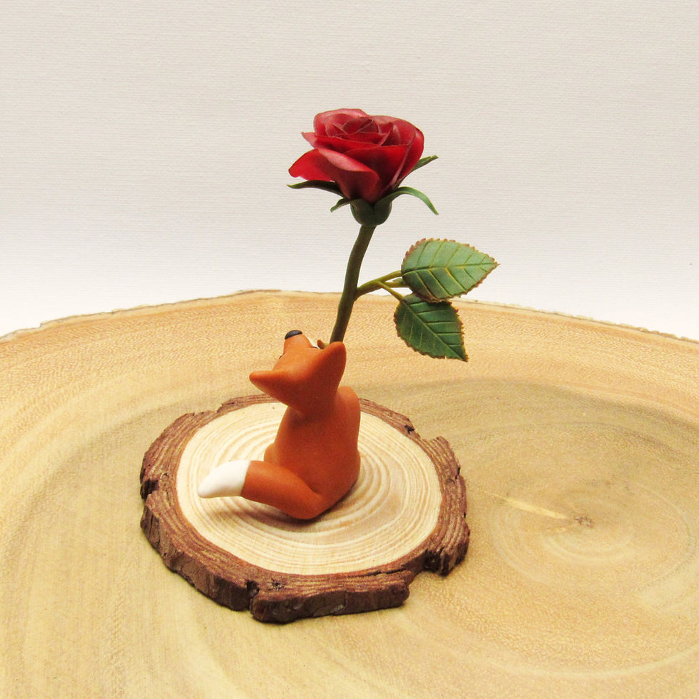 Thumbnail: Fox ornament with single red rose