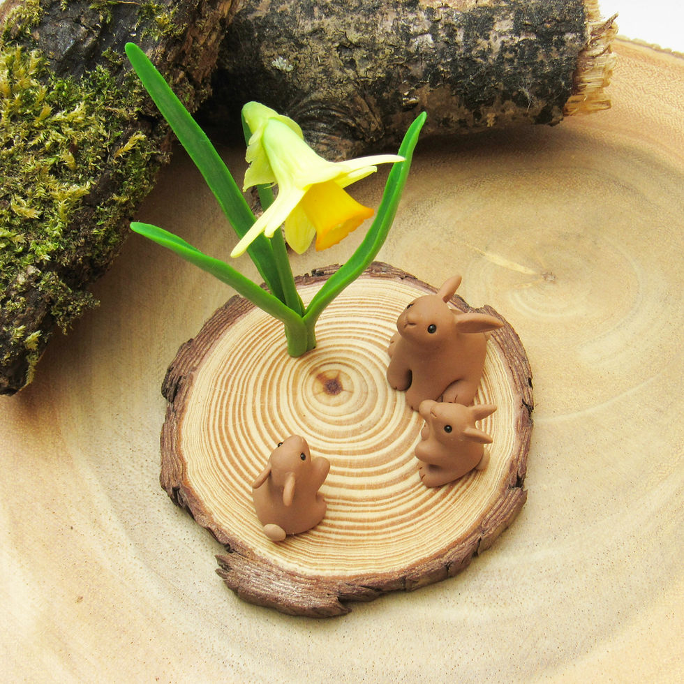 Thumbnail: Rabbit family with daffodil ornament