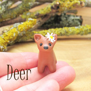 Deer collection button with tiny deer ornament