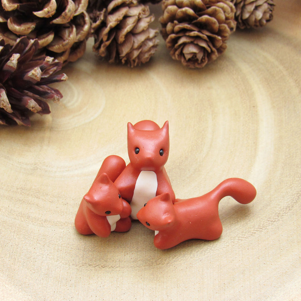 Tiny red squirrel ornament