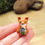 Thumbnail: Tiny fox with bluebells ornament