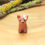 Thumbnail: Tiny roe deer ornament with daisy flower