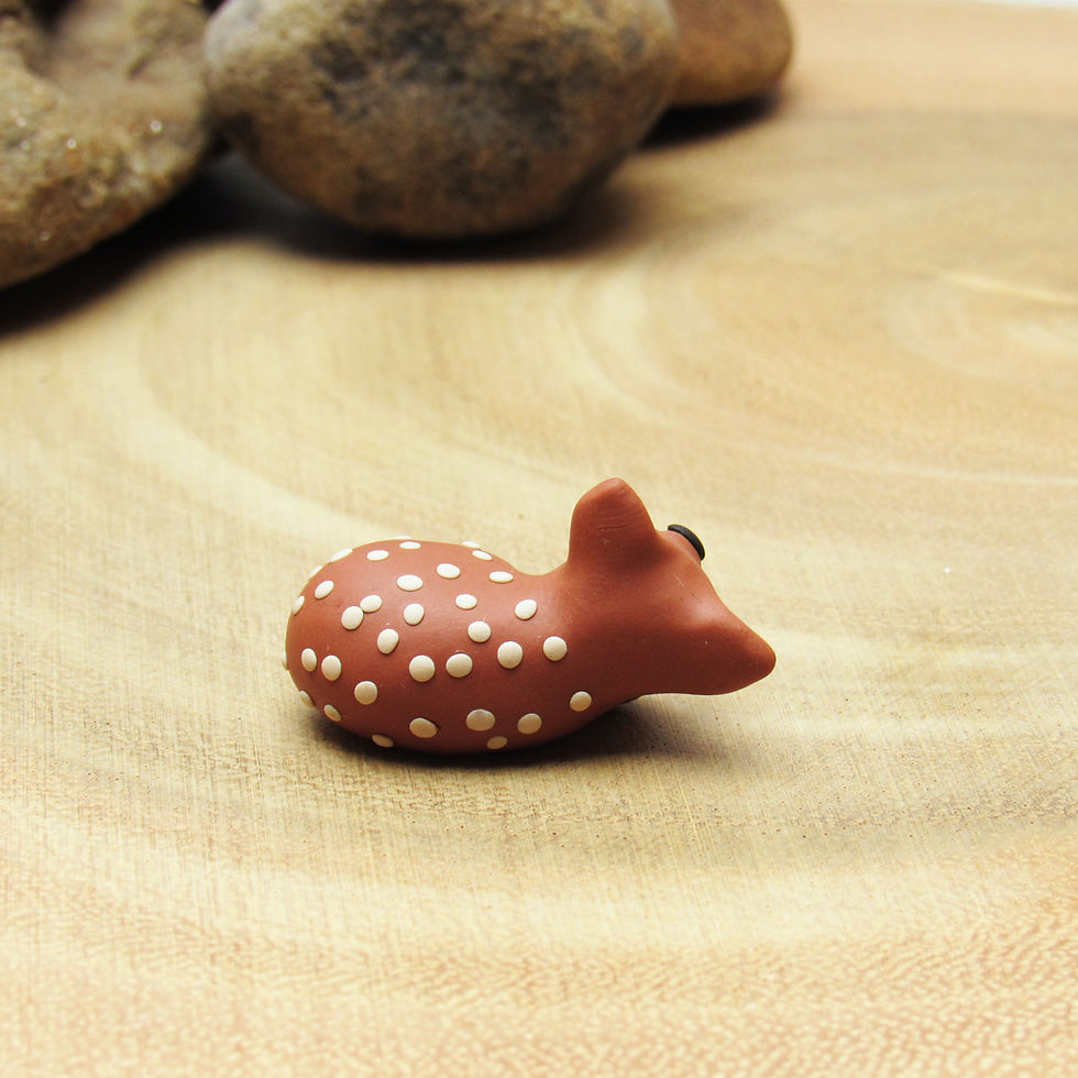 Tiny sleepy fawn ornament back view