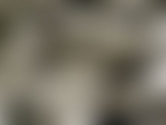 A pile of smoothly bent metal pipes, showcasing high-quality hydraulic bending results.