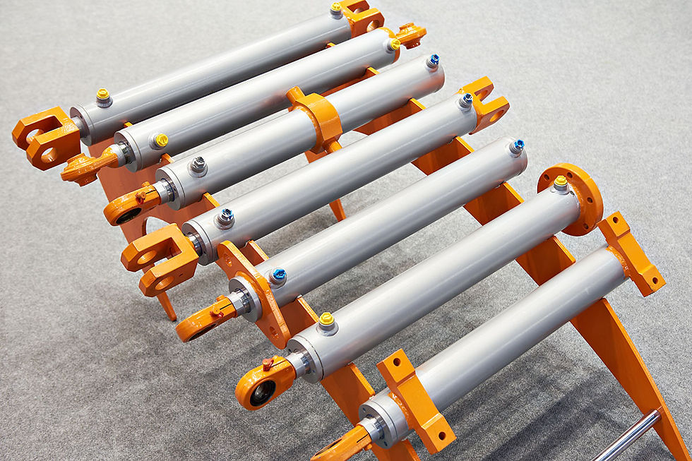 A rack of orange and gray hydraulic cylinders displayed on a stand.