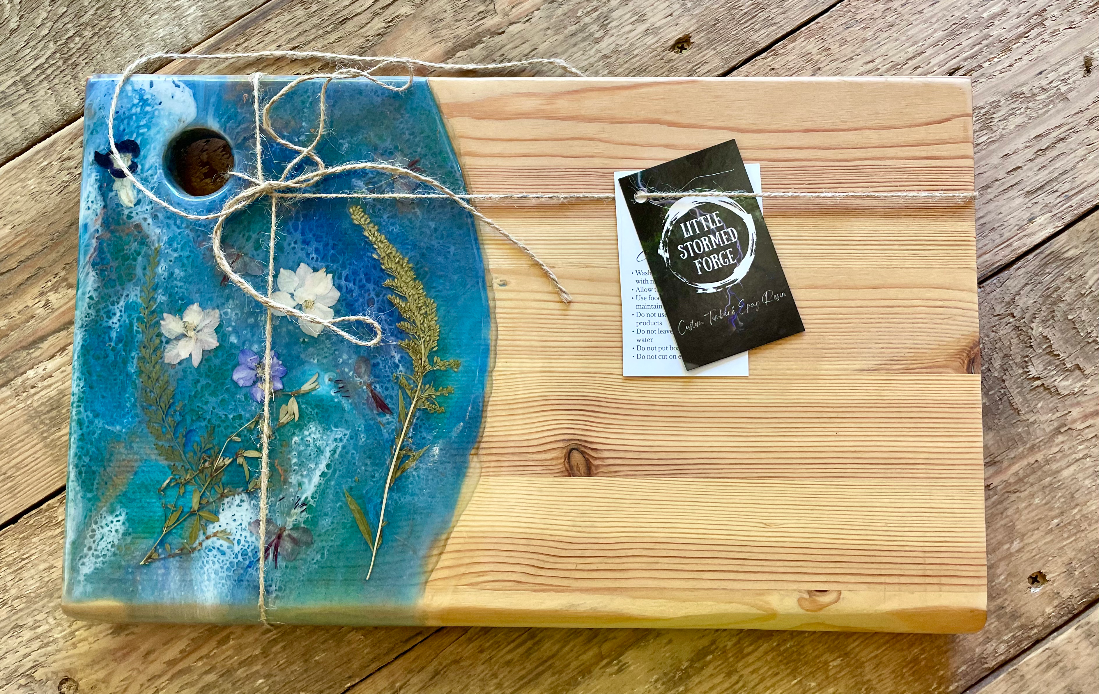 Blue Flowers on Pine