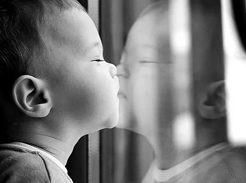 Baby-Kissing-on-Mirror.jpeg
