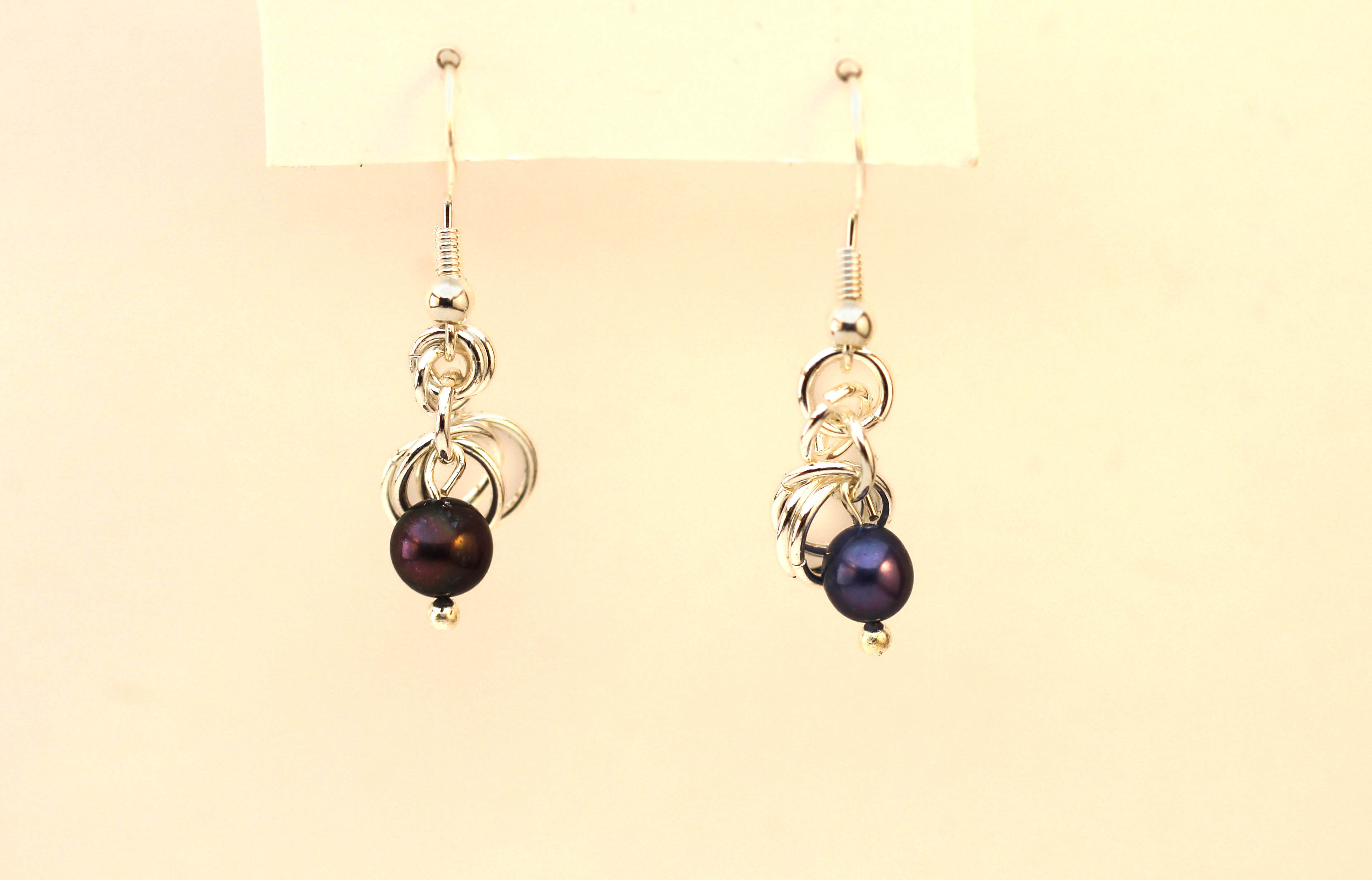 Irradiated pears (with the look of steel blue) paired with sterling silver