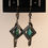 Thumbnail: Turquoise stones  surrounded with hermatite