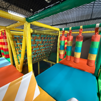 colorful indoor play structure at little exlplorers