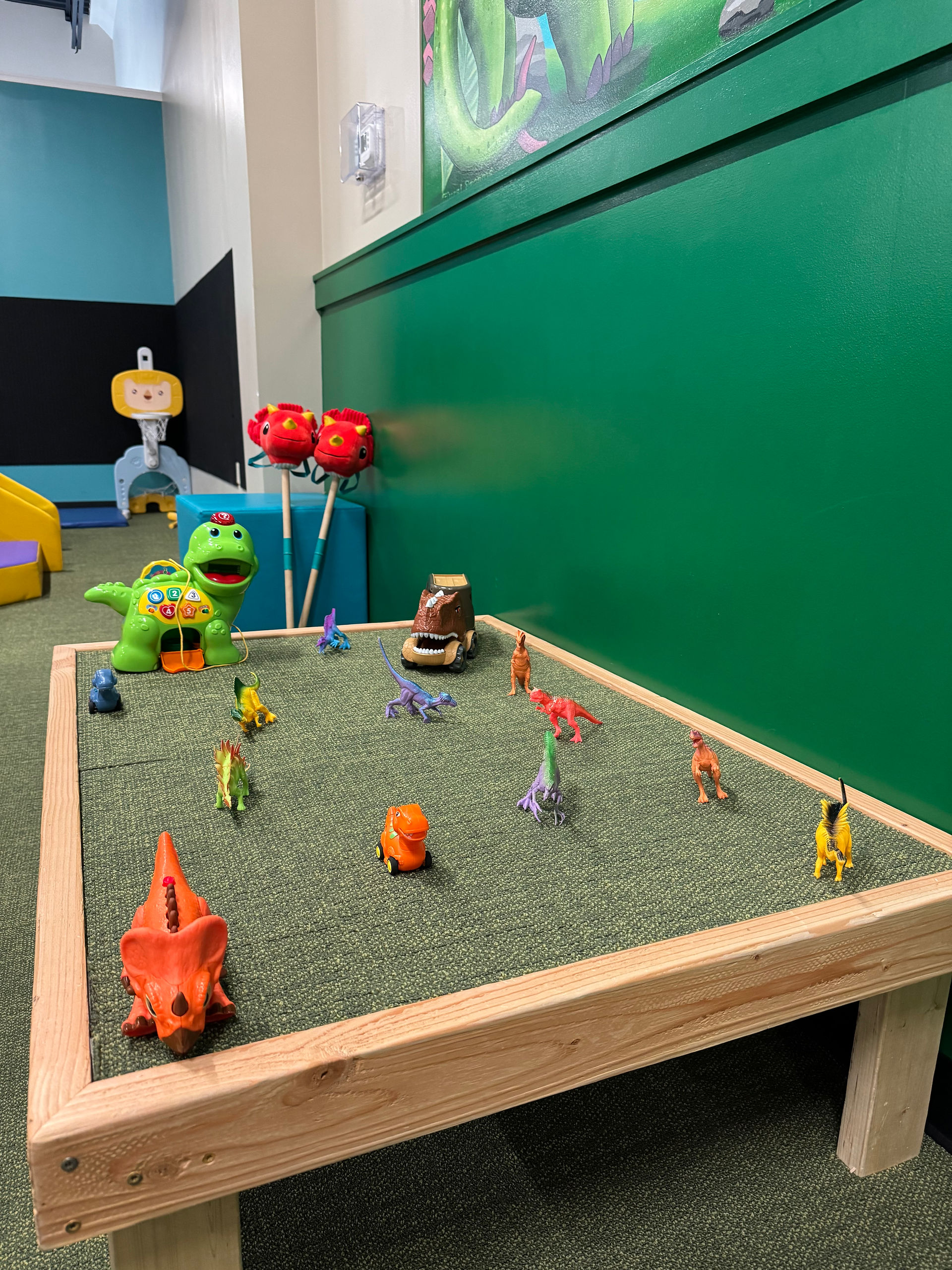 dinosaur play table at little explorers