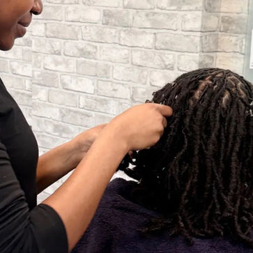 Locs 2strand twist style-Q2 Locs Parlour