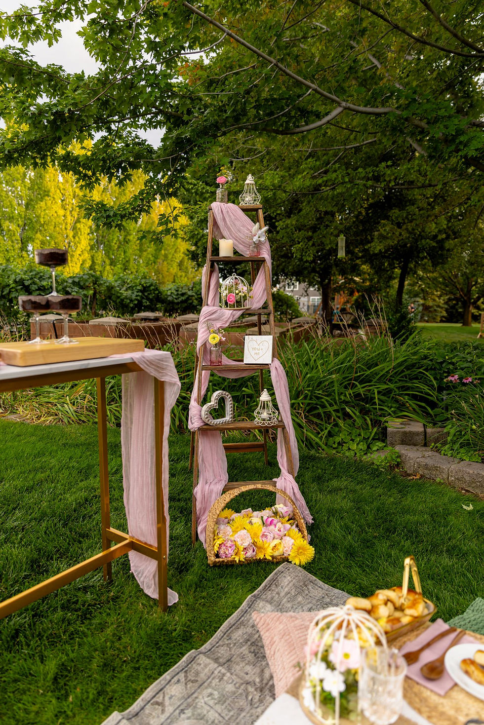 Thumbnail: Woven floral basket with rustic ladder at outdoor Utah wedding