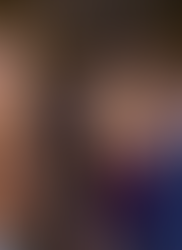 Groom dancing in front of trees wrapped with cafe lights in Utah.