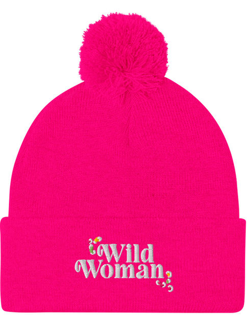 Pom-pom beanie embroidered with ‘Wild Woman.’ Cozy winter hat for free spirits.
