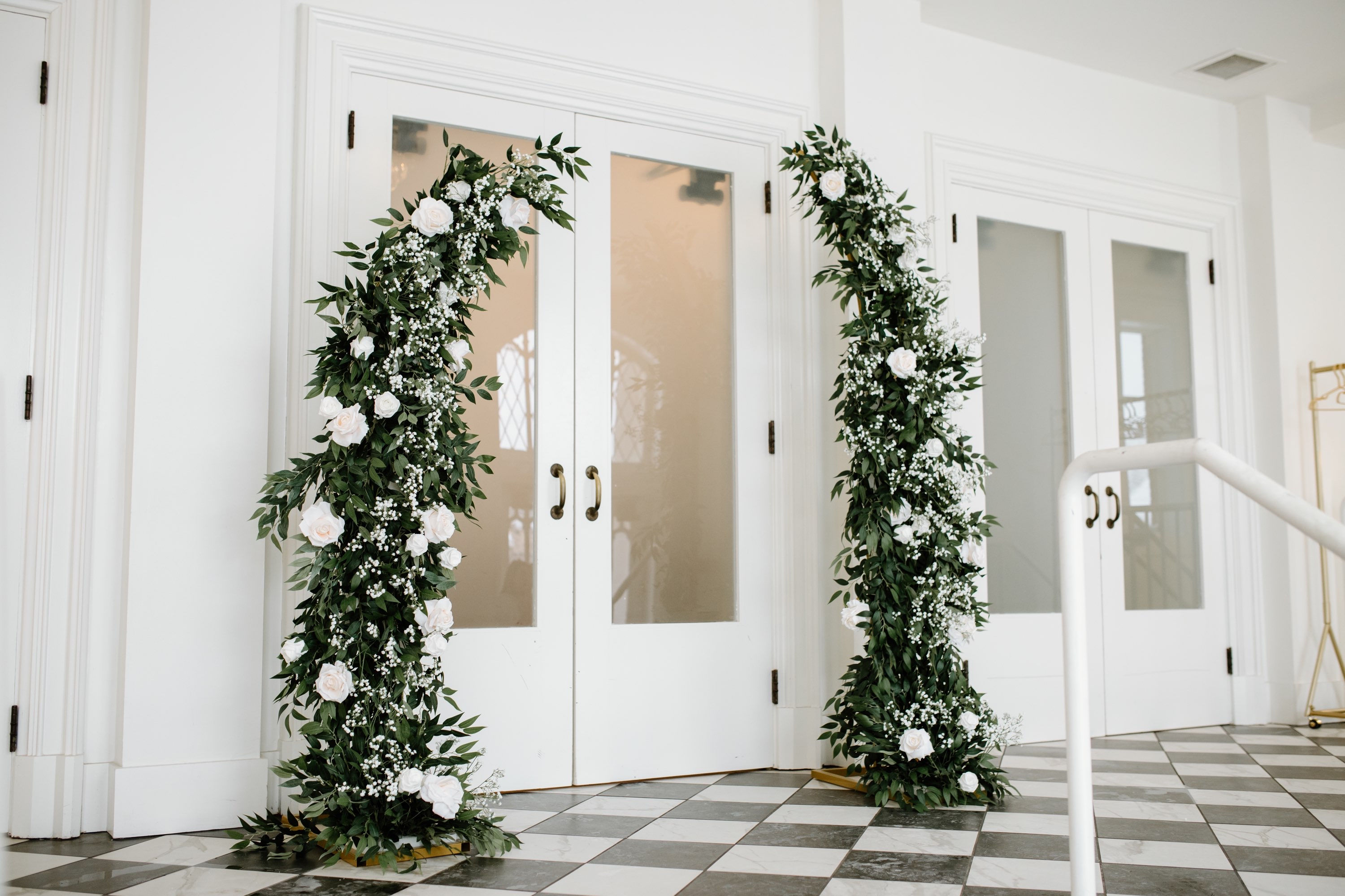 Greenery, Baby’s Breath and Rose Pillars