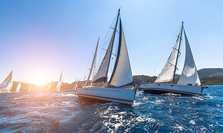 Sunset Sailboats