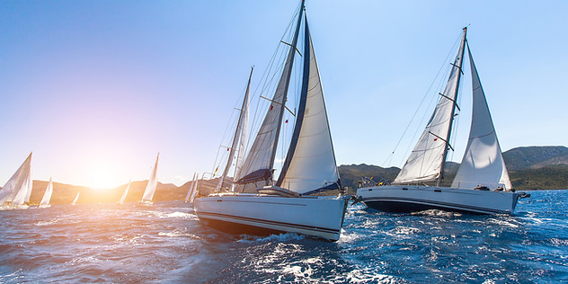 Sunset Sailboats