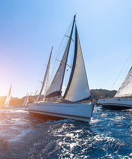 Sunset Sailboats