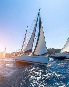 Sunset Sailboats
