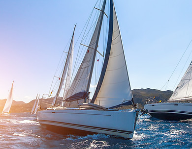 Sunset Sailboats