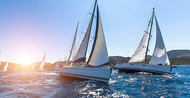 Sunset Sailboats