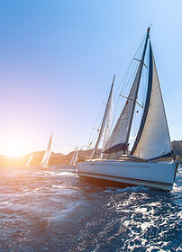 Sunset Sailboats