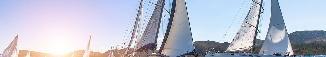 Sunset Sailboats