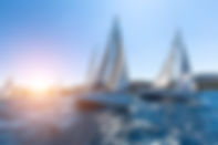 Sunset Sailboats