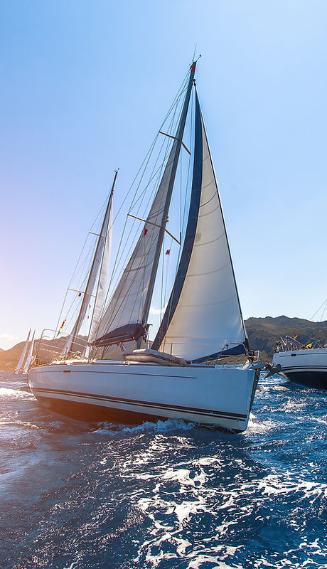 Sunset Sailboats