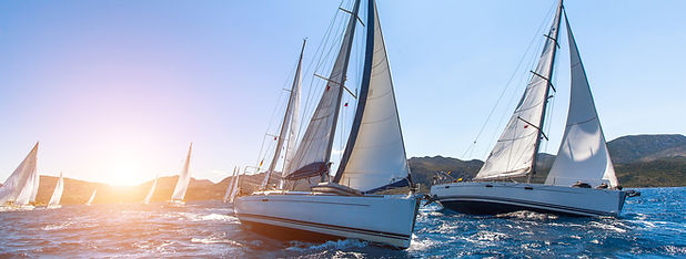 Sunset Sailboats