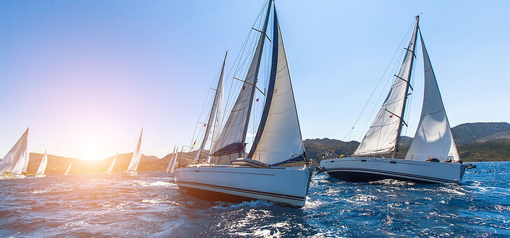 Sunset Sailboats
