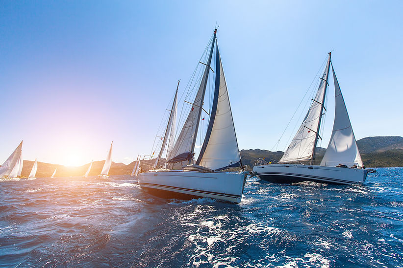 Sunset Sailboats