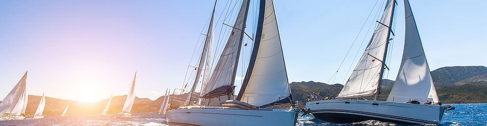 Sunset Sailboats